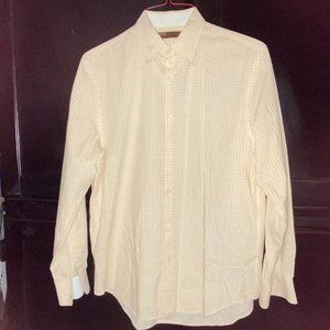 Medium yellow / white checkered long sleeve Perry Ellis button down shirt.